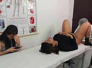 lesbian couple visits male gynecologist for kinky exam