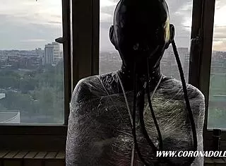 Masked In 1mm Rubber Catsuit For Outdoor Bondage Play