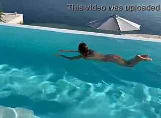 Monika Fox's pierced nipples glisten naked pool swim 😍🏊‍♀️