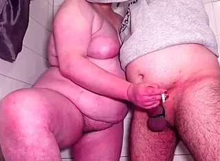 she strokes it out in handjob fun then cumshots hit tits ass feet and hairy belly
