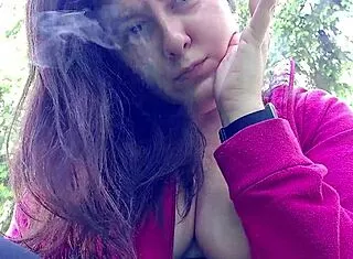 nicoletta pulls out big tits smoking public garden flash!