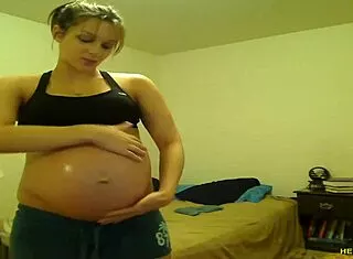 Pregnant Tori Taylor Teases Big Tits in Blue Shorts