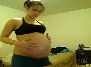Pregnant Tori Taylor Teases Big Tits in Blue Shorts