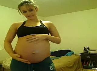 Pregnant Tori Taylor Teases Big Tits in Blue Shorts
