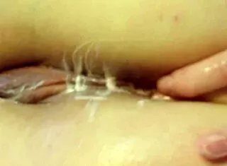 Beautiful milf's shaved ass stretched by intense anal fisting