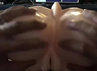 She gets her silicone tits and nipples massaged sensually