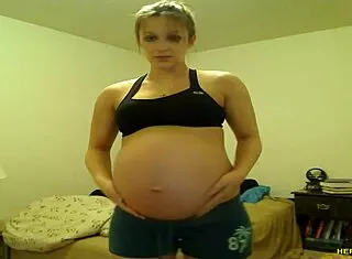 Pregnant Tori Taylor Teases Big Tits in Blue Shorts
