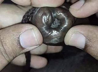 foreskin tied tight rod shoved deep into throbbing peehole