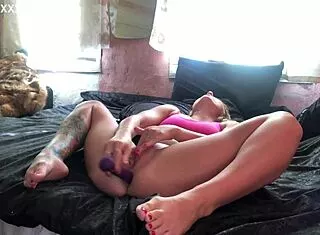 shaved clit buzzed while anal dildo stretches her solo hole