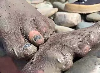Goddess Dips Messy Barefoot Toes In Torn Pantyhose By River For Close-Ups