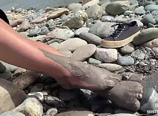 Goddess Dips Messy Barefoot Toes In Torn Pantyhose By River For Close-Ups