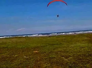 Priscila Belini naked masturbates paramotor beach flight