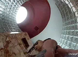 Christy Mack's tattooed tits and ass tease in backstage shower fun
