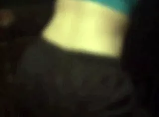brunette babe dances stripping big tits ass at packed night club