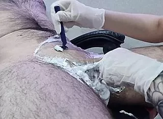 nurse shaves patient's groin smooth then strokes cock for happy ending handjob