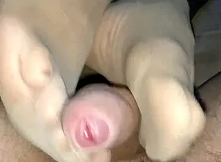 girlfriend gives teasing footjob in homemade tan nylon stockings