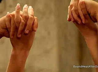 Domme masturbates watching bound slaves lick pussy