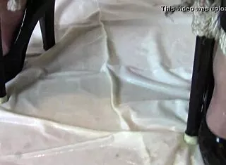 bound milf in heels endures humiliating leather hood despair