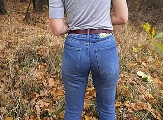 milf shakes amazing ass in tight blue jeans outdoors