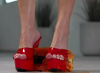 petite brunette crushes fruits under high heels in steamy foot fetish tease