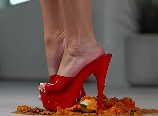 petite brunette crushes fruits under high heels in steamy foot fetish tease