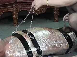 Japanese Mistress Tomoki Tortures Nipples and Dicks of Mummified Masochists