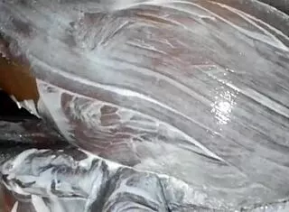 african dude slathers lotion over monster black cock and fat ass solo in bedroom stroking hard