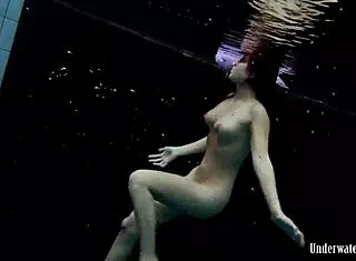 Aneta’s Big Tits Shine in Purple Pool Dress