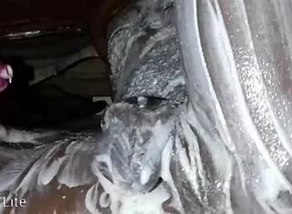 african dude slathers lotion over monster black cock and fat ass solo in bedroom stroking hard