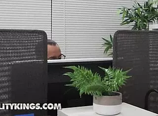 Kira Noir titty-fucks Van under desk then impales on cock!