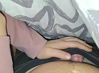 Busty girlfriend's teasing handjob before bed