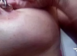 kinky mother extreme big pierced nipples with nipplerings through nipple tunnels close up