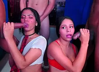 Two girls kneeling throat fucked by 3 men in rough domination