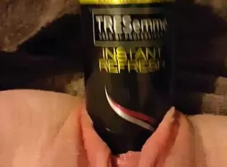 young slut fucks gaping pussy with 6 3 round hairspray can