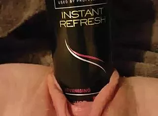 young slut fucks gaping pussy with 6 3 round hairspray can