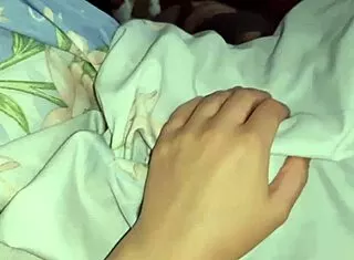 I take turns playing with my neighbors pussies under the blanket