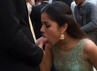 Bride sisters suck big cocks at wedding in group blowjob