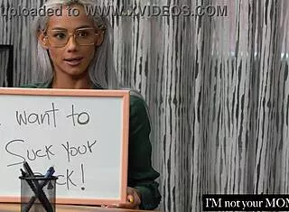 latina teacher shows classroom lesson plan