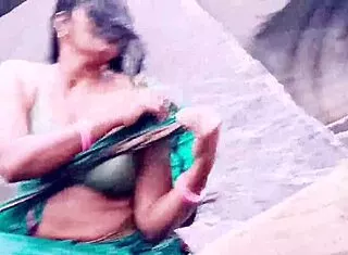 Villege aunty outdoor water fall bathing with dirty talks