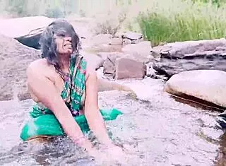 Villege aunty outdoor water fall bathing with dirty talks