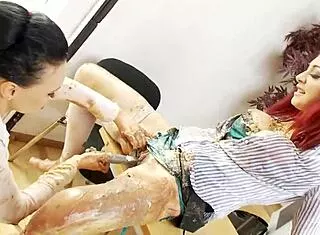 Lesbian food fight with dildo fun