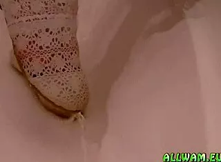 Sweet horny girl in jeans miniskirt shaving her pussy