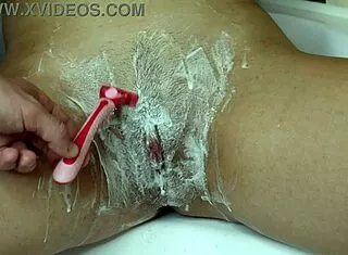 shaving a hairy pussy with a trimmer and a razor with shaving foam runway close-up free