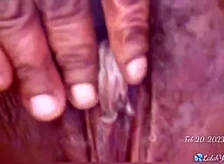 This milf fucks her pussy with a bottle.