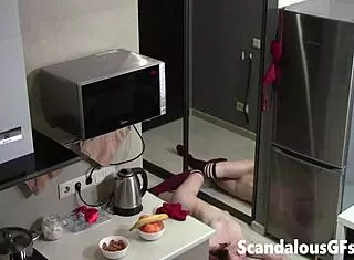 Redhead sizzles in matching bra and panties, stripping down to reveal her tattooed ass