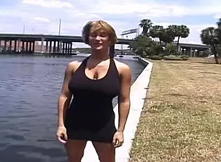 Mindy FLASHES her HUGE TITS in risky outdoor public nudity