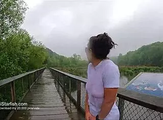 brunette milf flashes wet ass in leggings