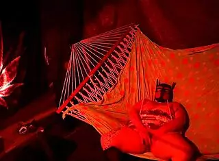 Amateur BBW fingering her wet pussy in a tent hammock