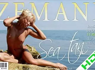 Jessika strips outdoors, clothes ripping wet and wild.