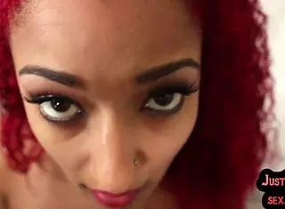 tattooed redhead teases before riding cock